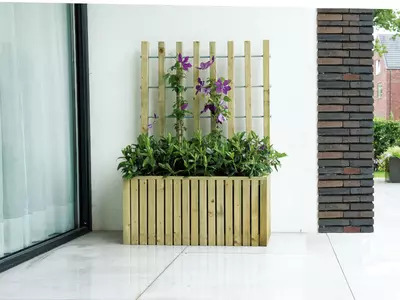 De mooiste houten plantenbakken voor je tuin!
