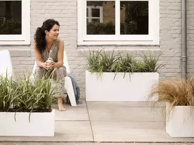 DIY terrasafscheiding met deze plantenbakken