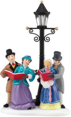 Dickens' Village Caroling by Lamplight