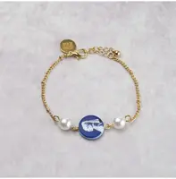 Heinen Delfts Blauw armband meisje met de parel goud